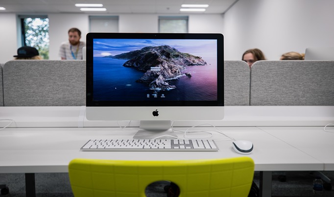 An apple mac computer in a classroom