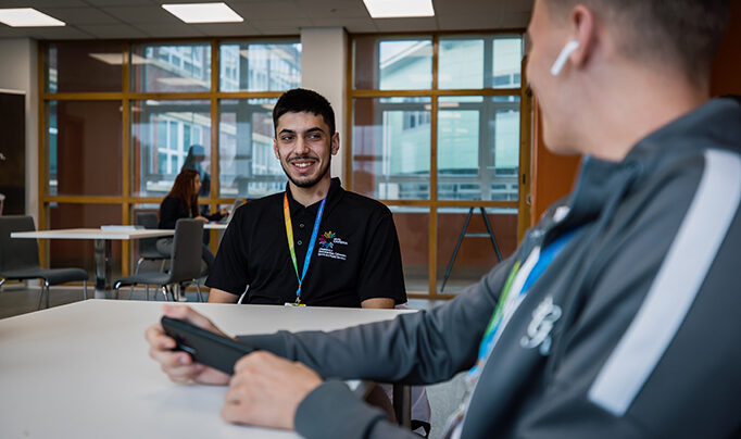 Mental Health Subject Image of two learners sat down talking