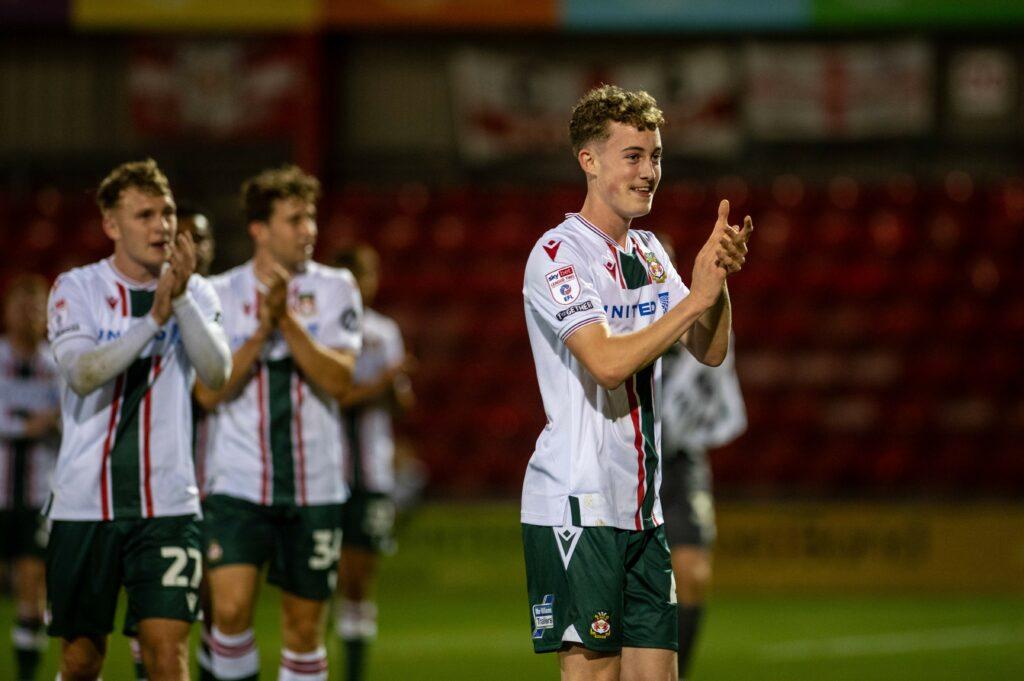 A COLEG CAMBRIA student is on cloud nine after making his Wrexham AFC debut