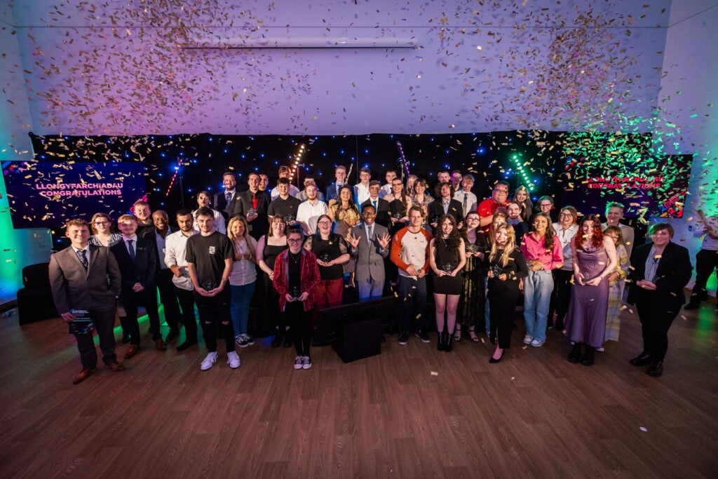 Further & Higher Education students celebrating their achievements and standing for a group photo at the Student Awards 2024