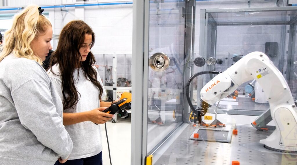 two female students in an engineering environment for the news story 'Building the Future Starts Here – Engineering Lecturing Roles Now Open'