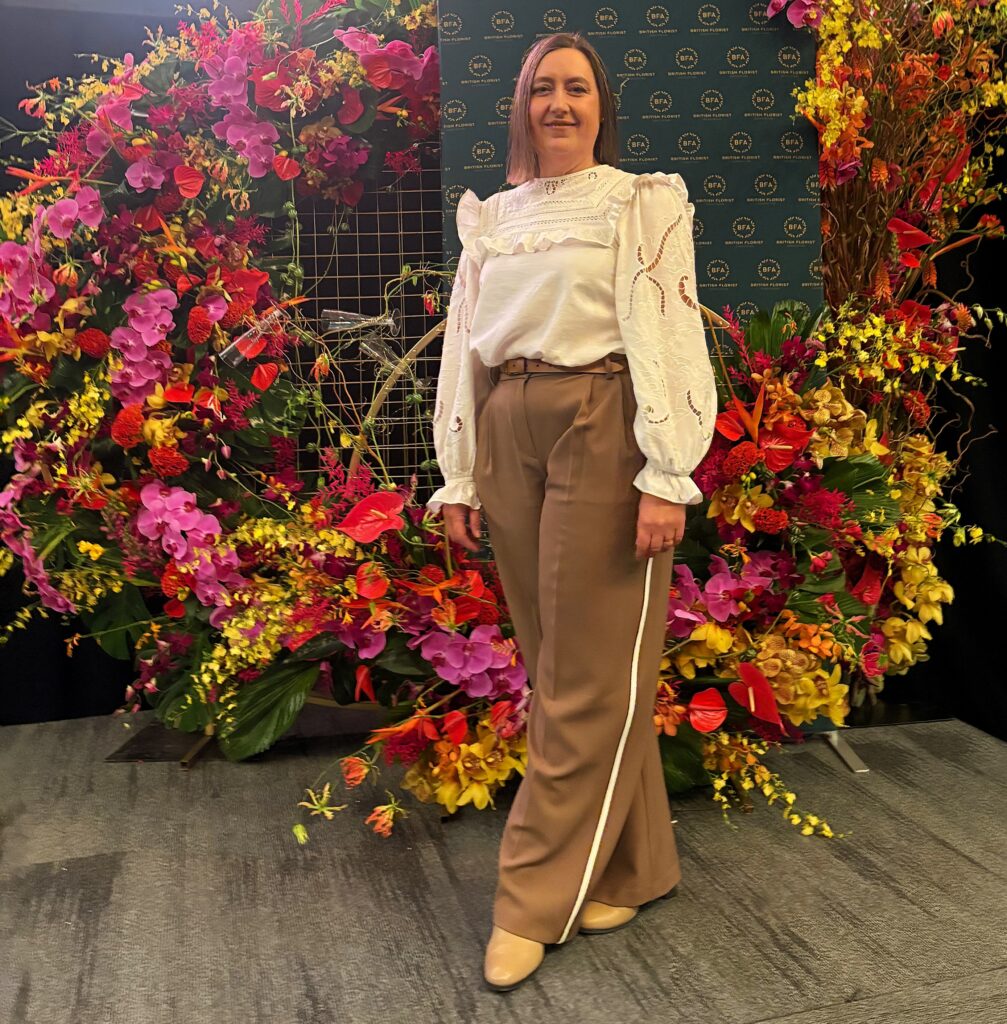 A FLOURISHING floral designer blossomed into national recognition after being crowned UK Florist of the Year: Newcomer at the British Florist Association (BFA) Awards.