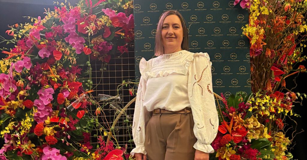 A FLOURISHING floral designer blossomed into national recognition after being crowned UK Florist of the Year: Newcomer at the British Florist Association (BFA) Awards.