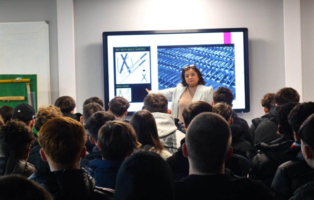 A KNIFE crime campaigner whose son was killed in a tragic case of mistaken identity just yards from their family home delivered a deeply moving and inspiring talk to students in Wrexham.