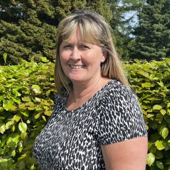 Finance Manager, Dawn Kavanagh standing outside for a leadership team photo